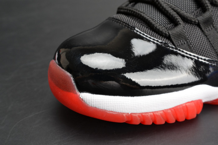 air jordan 11 retro low "bred" black/ red mens 528895-012